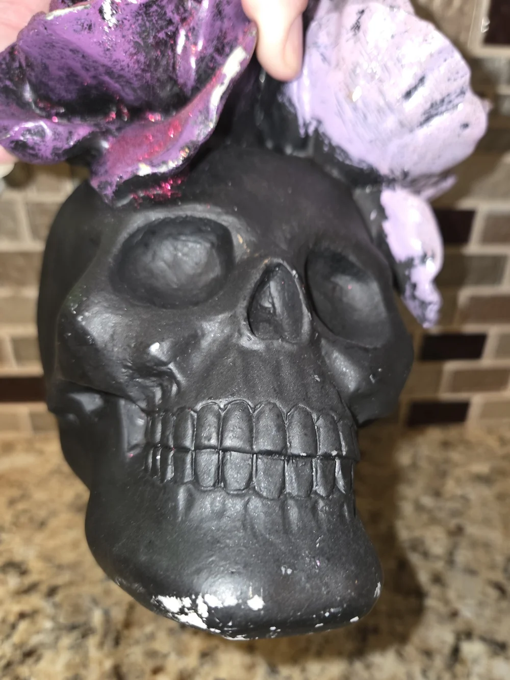 Black Resin Decorative Halloween Skull with Purple Lavender & Orange Flowers